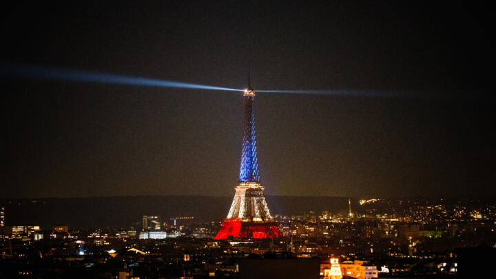 The Eiffel Tower is illuminated in the colours of the French national flag to commemorate the 10th Anniversary of the 2015 Paris terror attacks.