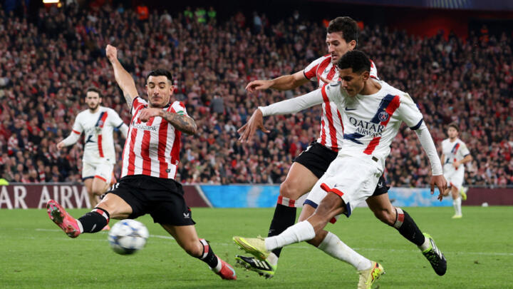 Paris St Germain's Senny Mayulu shoots at goal during PSG vs Athletic Bilbao on December 10, 2025 in San Mames, Bilbao, Spain.