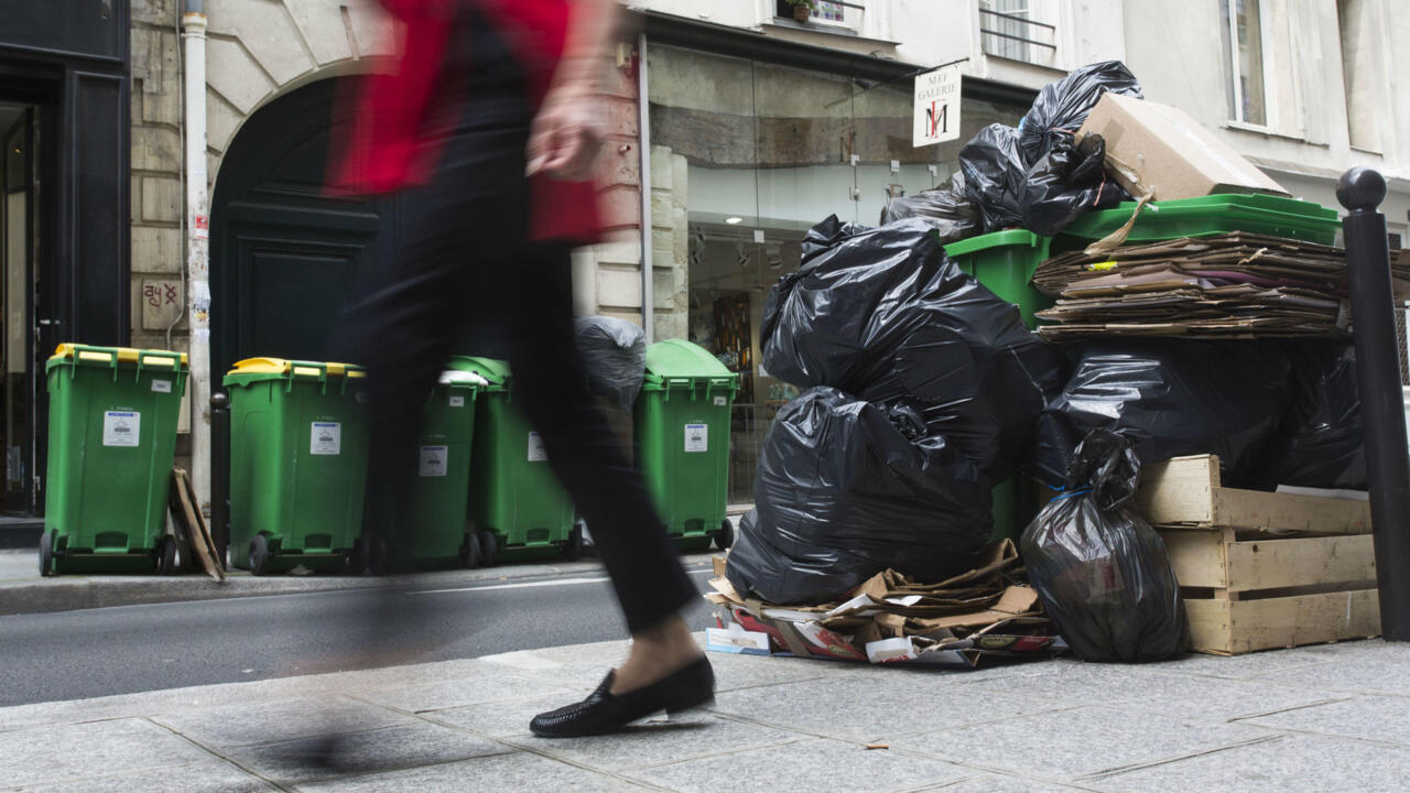Rubbish piles up in Paris streets amid ongoing labour reform strikes