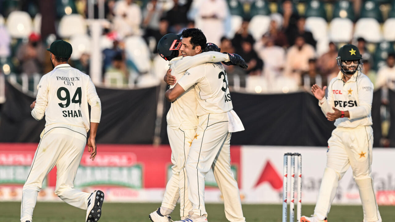 Pakistan's Asif Afridi (2R) celebrates with teammates after taking the wicket of South Africa's Dewald Brevis
