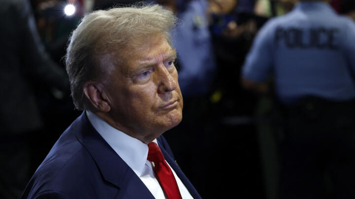 Republican presidential nominee, former U.S. President Donald Trump speaks to reporters after debating US Vice President Kamala Harris, at Pennsylva