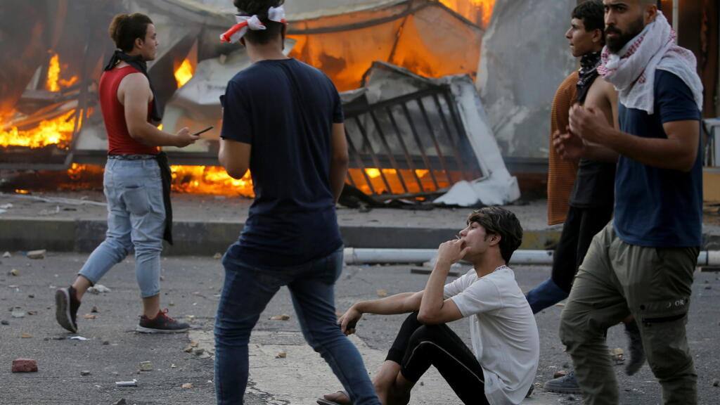 Two Iraqis killed at protest in Iraq over unpunished killings