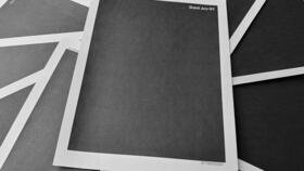 Pages from a totally redacted New York grand jury file into Jeffrey Epstein and Ghislaine Maxwell, released by the US Justice Department on December 19, 2025.