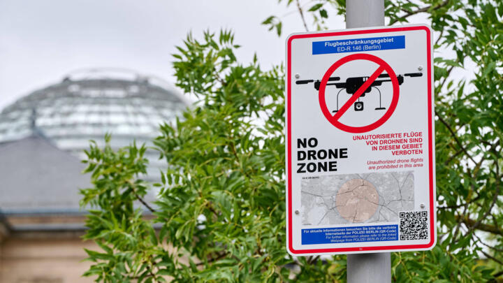 A sign reads “No Drone Zone” in the government district near the Reichstag building in Berlin on October 6, 2025.