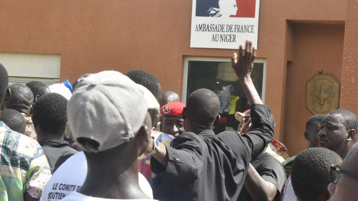 In this photo taken on July 30, 2023, protesters are seen outside the French embassy in Niamey, Niger during an anti-French demonstration.