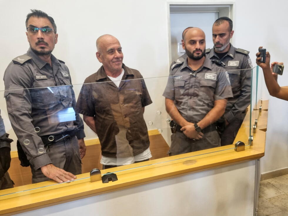 Israeli citizen Moti Maman stands in a courtroom after he was accused by Israeli security services of involvement in an Iranian-backed assassination plot targeting prominent people.
