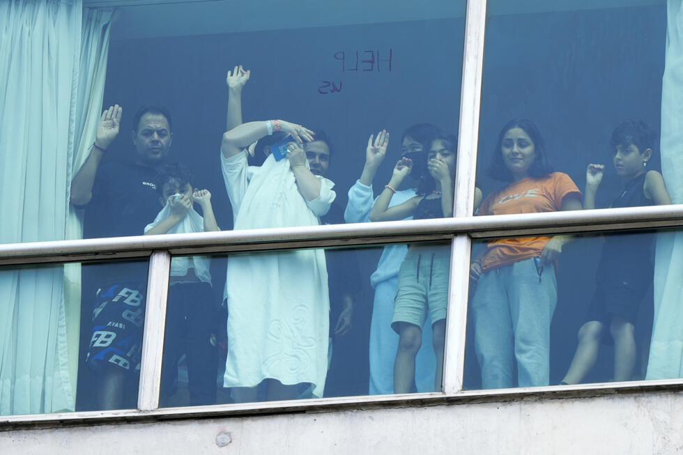 Des migrants expulsés par les États-Unis, temporairement logés à l'Hôtel Decapolis de Panama le 18 février 2025.