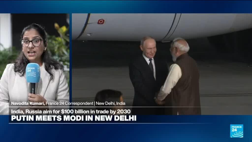 Hugs and greetings: Vladimir Putin has just arrived in India for talks with Modi