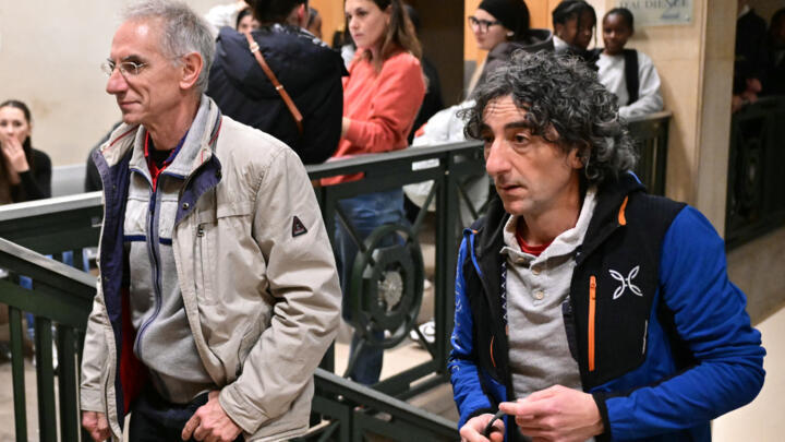 Basile Heresanu and Georges Sitja arrive to appear before a judge at a courtroom in Marseille, southern France, on February 27, 2025.