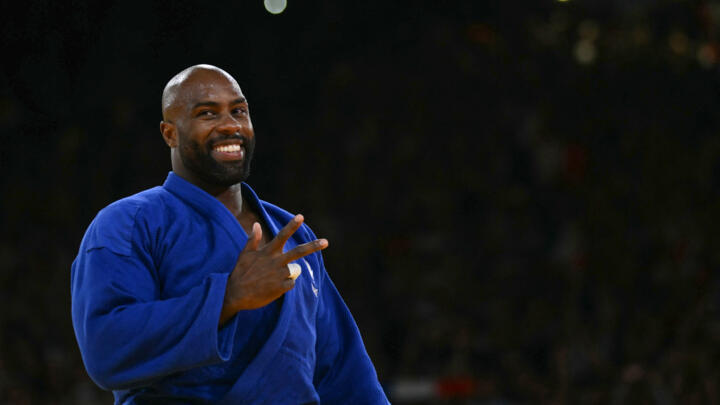 France's Teddy Riner (Blue) reacts after beating South Korea's Kim Min-jong in judo at the Paris 2024 Olympic Games at the Champ-de-Mars Arena, in Paris on August 2, 2024.
