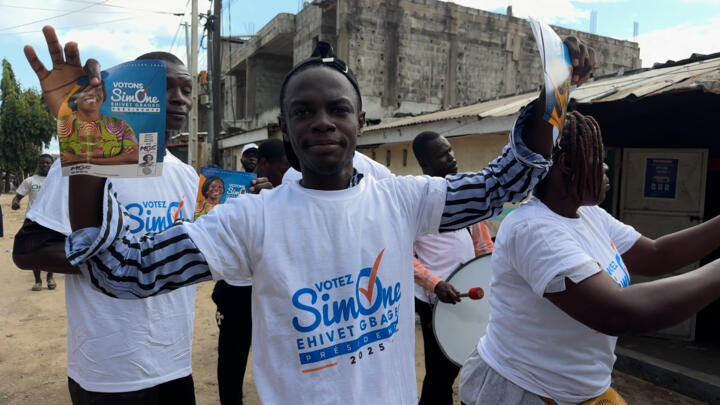 André, a young activist from Yopougon, during a rally for his candidate, Simone Ehivet, in Yopougon.