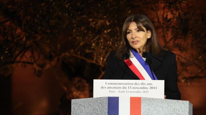 Paris' mayor Anne Hidalgo delivers a speech during a ceremony marking a decade since the terror attacks of November 13, 2015 in which 130 civilians were killed, at the "Jardin du 13 novembre 2015" in Paris on November 13, 2025.