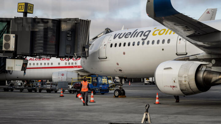 This photograph shows a Vueling plane sitting on the tarmac of the Saint Exupery Airport in Colombier Saugnieu, in southeastern France, on February 5, 2024.