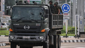 Royal Thai Army soldiers are transported on the back of an army truck in the Thai border province of Si Sa Ket on July 26, 2025.