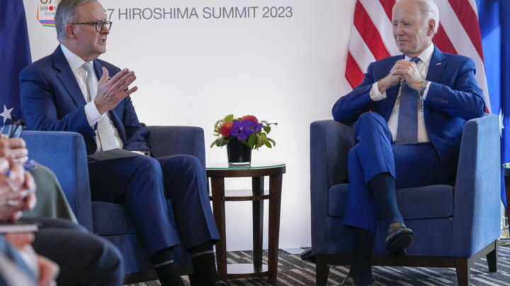 President Joe Biden, right, and Australia's Prime Minister Anthony Albanese meet on the sidelines of the G7 Summit in Hiroshima, Japan, Saturday, May 20, 2023.