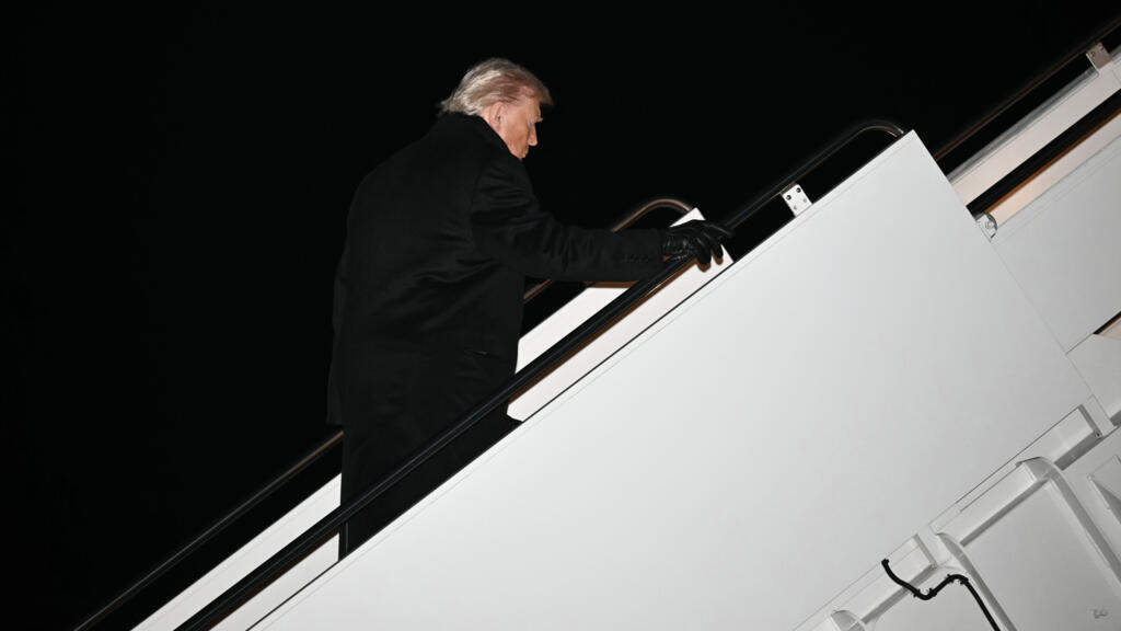 US President Donald Trump boards Air Force One at Joint Base Andrews on January 20, 2026