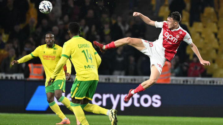 Monaco's Russian midfielder Aleksandr Golovin shoots the ball during  the French L1 football match between FC Nantes and AS Monaco at the Stade de la Beaujoire-Louis Fonteneau in Nantes, on October 29, 2025.