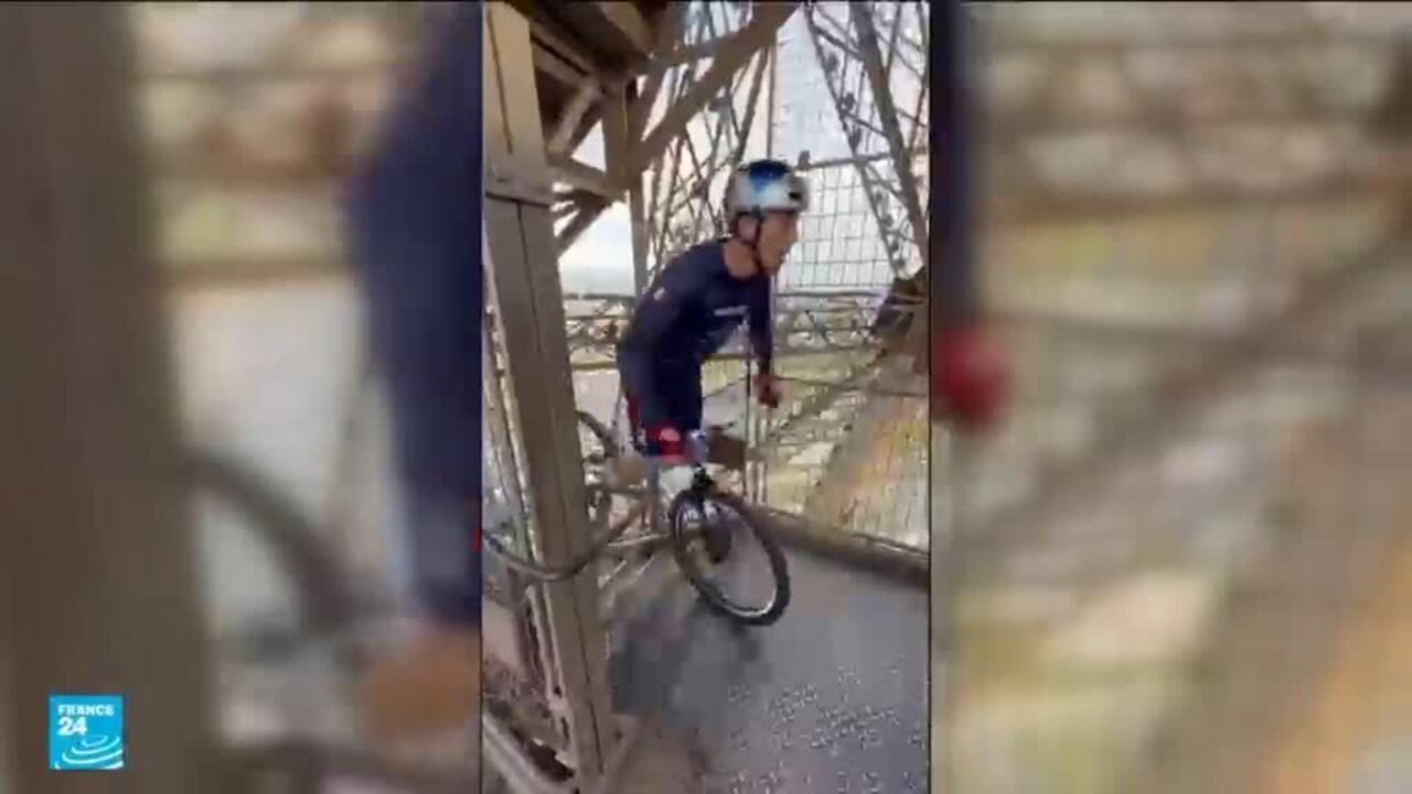 فرنسي يصعد إلى أعلى درج برج إيفل .. على دراجة هوائية