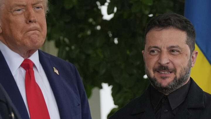President Donald Trump greets Ukraine's President Volodymyr Zelensky at the White House on August 18, 2025.