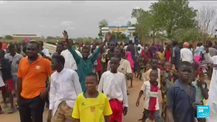 'We don't want ECOWAS here, we want peace': Thousands of coup supporters gather in Niger