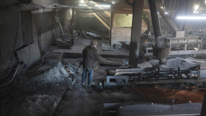 A worker processes the ore to purify ilmenite, a key element used to produce titanium, in Kirovohrad, Ukraine, on February 12, 2025.