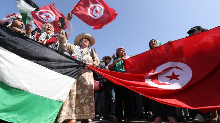 Activists, heading towards Gaza by land to break the siege on the war-battered territory arrive in Zawiyah, about 45 kilometres west of the Libyan capital Tripoli, on June 10, 2025.