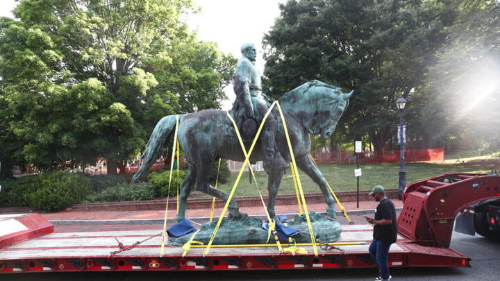 The monument of Robert E. Lee is removed on Saturday, July 10, 2021 in Charlottesville, Virginia.