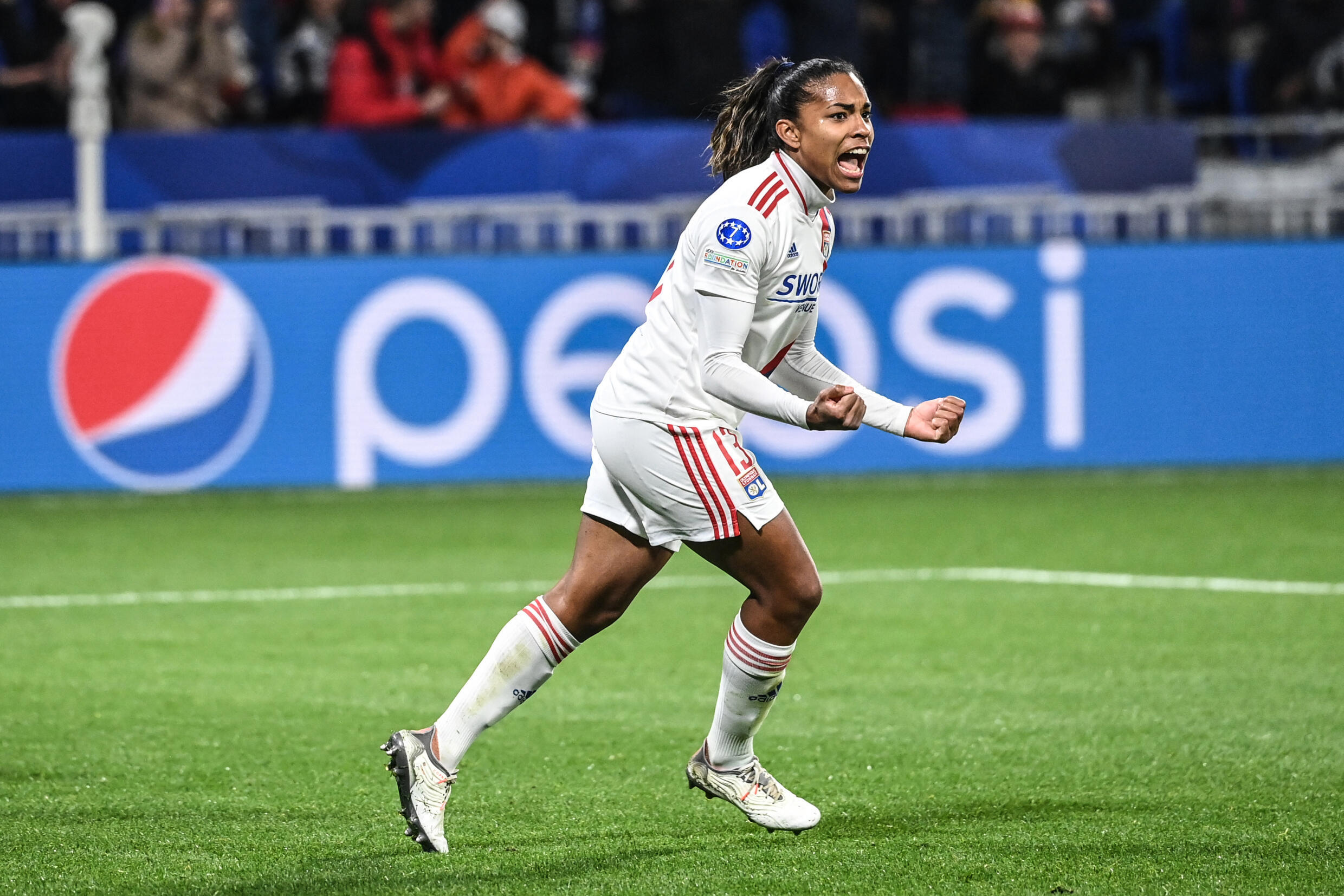 Lyon's Catarina Macario celebrates after scoring against Juventus in the quarter-finals