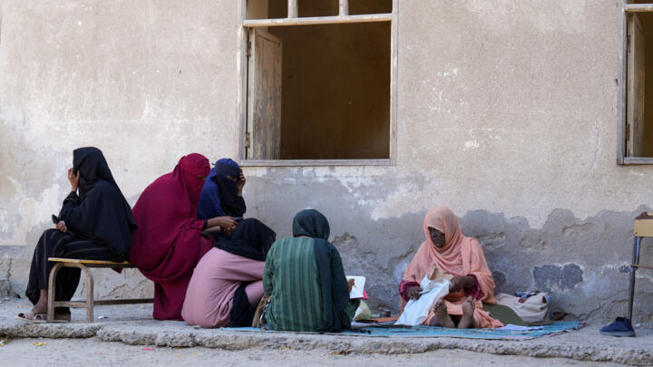 Displaced people attend a class for adults in Port Sudan on February 9, 2025.