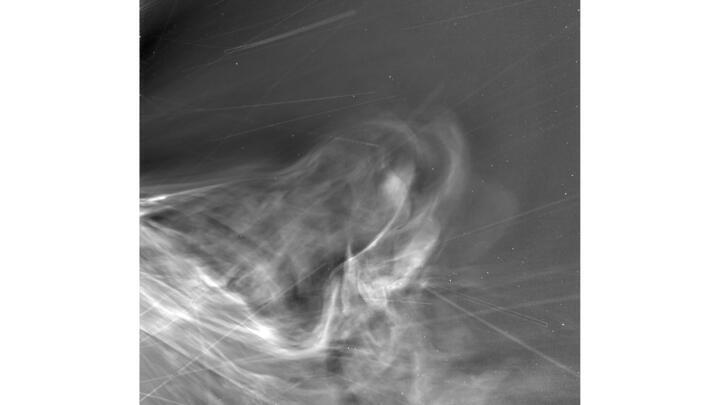 A photo taken by Parker Solar Probe's WISPR instrument during its record-breaking flyby of the Sun, showing the solar wind racing out from the Sun's corona, or outer atmosphere, provided by NASA on July 15, 2025. 