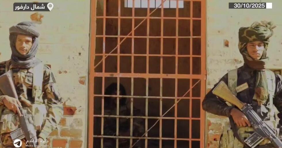 This screengrab was taken from a video posted by the RSF on their official Telegram channel on October 30, 2025. It shows Abu Lulu held behind bars by members of the militia.