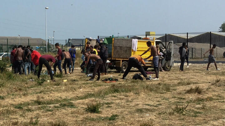 French court orders Calais officials to provide migrants with water