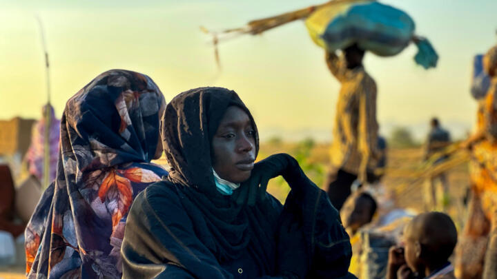 A resident who fled El-Fasher after the city was captured by Sudanese paramilitaries of the FSR rests in Tawila, where displaced people from the conflict are flocking, on October 28, 2025.