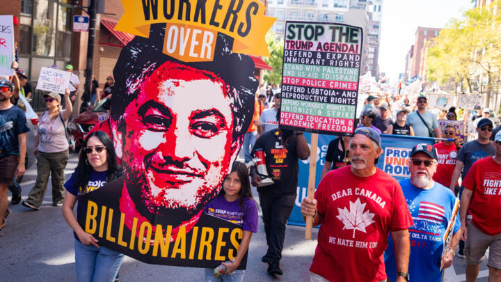 People participate in the Labor Day Workers Over Billionaires rally, in solidarity with unions and advocacy groups, on September 1, 2025 in Chicago, Illinois.