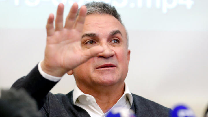 Serbian tennis player Novak Djokovic's father Srdjan is shown at a press conference in Belgrade on January 10, 2022.