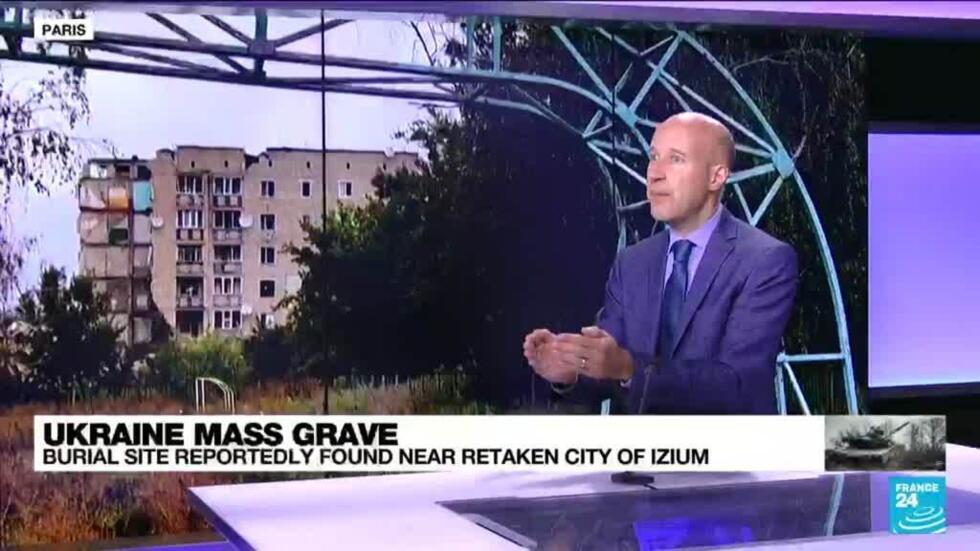 Ukraine combs mass burial site in Izium, says signs of torture found