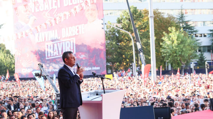 Leader of Turkey's main opposition party, Republican People's Party (CHP), Ozgur Ozel, speaks on stage during a rally, in Ankara, on September 14, 2025.