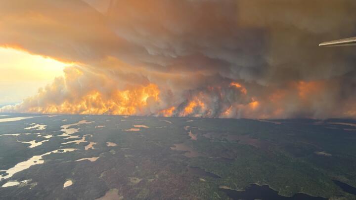 This May 27, 2025, aerial image courtesy of the Manitoba Government, shows wildfires burning in Flin Flon, Manitoba, Canada.