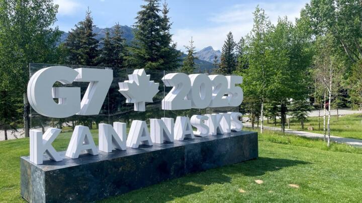 A landmark sign of the G7 2025 logo is seen on the lawn outside the Banff media center ahead of the Group of Seven (G7) Summit in Kananaskis, Alberta, Canada on June 16, 2025.