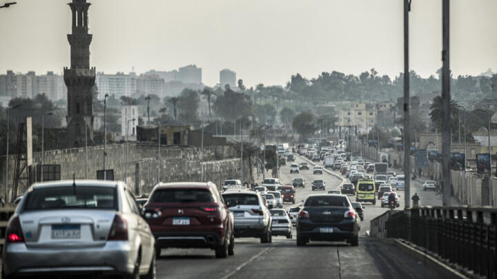 This picture taken on February 22, 2021 shows a view of vehicles stuck in a traffic jam in the Sayeda Aisha district of Egypt's capital Cairo.
