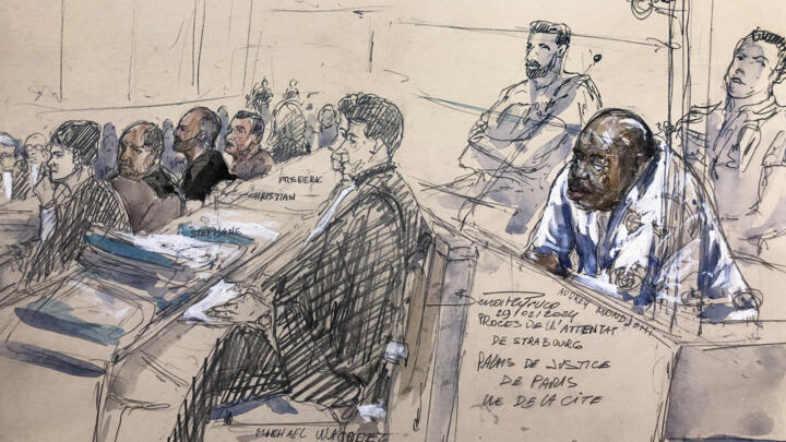 This sketchshows defendant Audrey Mondjehi (2ndR) looking on next to his lawyer Mickael Wacquez (C) during the trial over the attack at the Strasbourg Christmas market in 2018.
