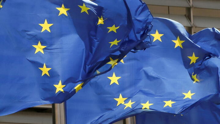 European Union flags flutter outside the EU Commission headquarters in Brussels, Belgium May 5, 2021. 