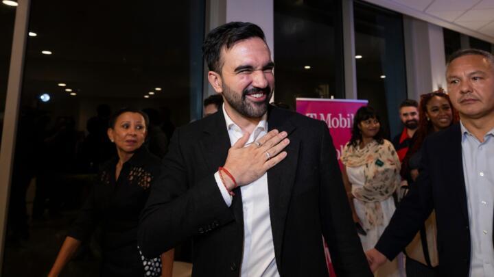 New York City Mayor-elect Zohran Mamdani, accompanied by Rep. Nydia Velazquez, D-NY, left, arrive to SOMOS Puerto Rico conference at the Caribe Hilton Hotel in San Juan, Puerto Rico, November 6, 2025.