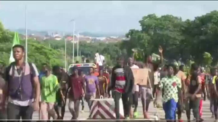 Rights group says security forces have killed 13 as Nigeria protests over hardship enter a third day