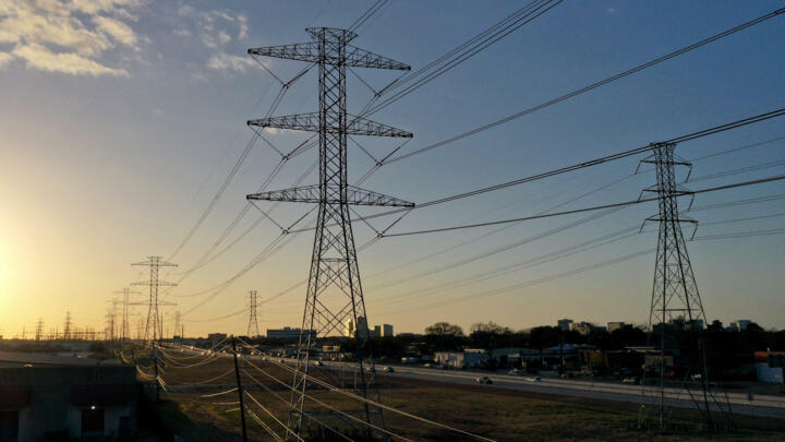 File photo of high voltage transmission towers on February 21, 2021 in Houston when millions of Texans lost power during winter storm Uri.