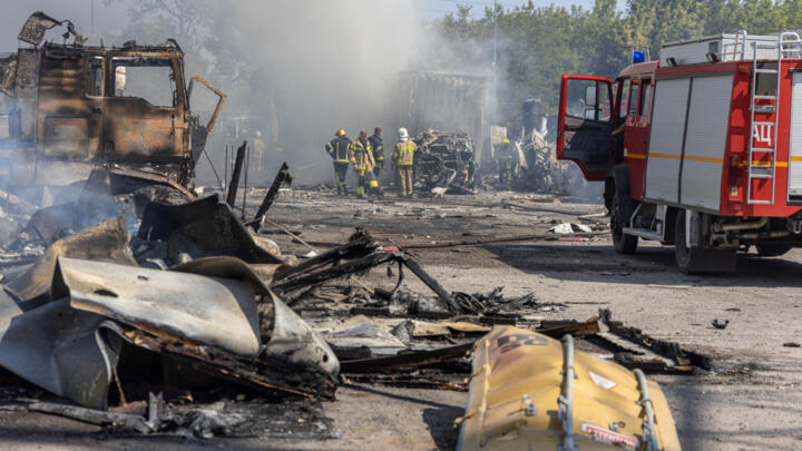 Ukrainian firefighters extinguish a fire on a site following an air attack, in the Odesa region, on August 26, 2024, amid the Russian invasion of Ukraine. Russian drones and missiles on August 26, 202