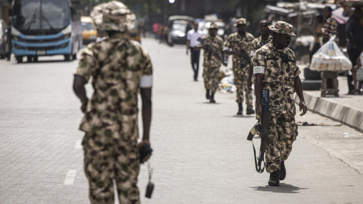 Soldiers from the Nigerian Armed Forces patrol and secure the streets in Lagos Island, Lagos, on February 27, 2023.