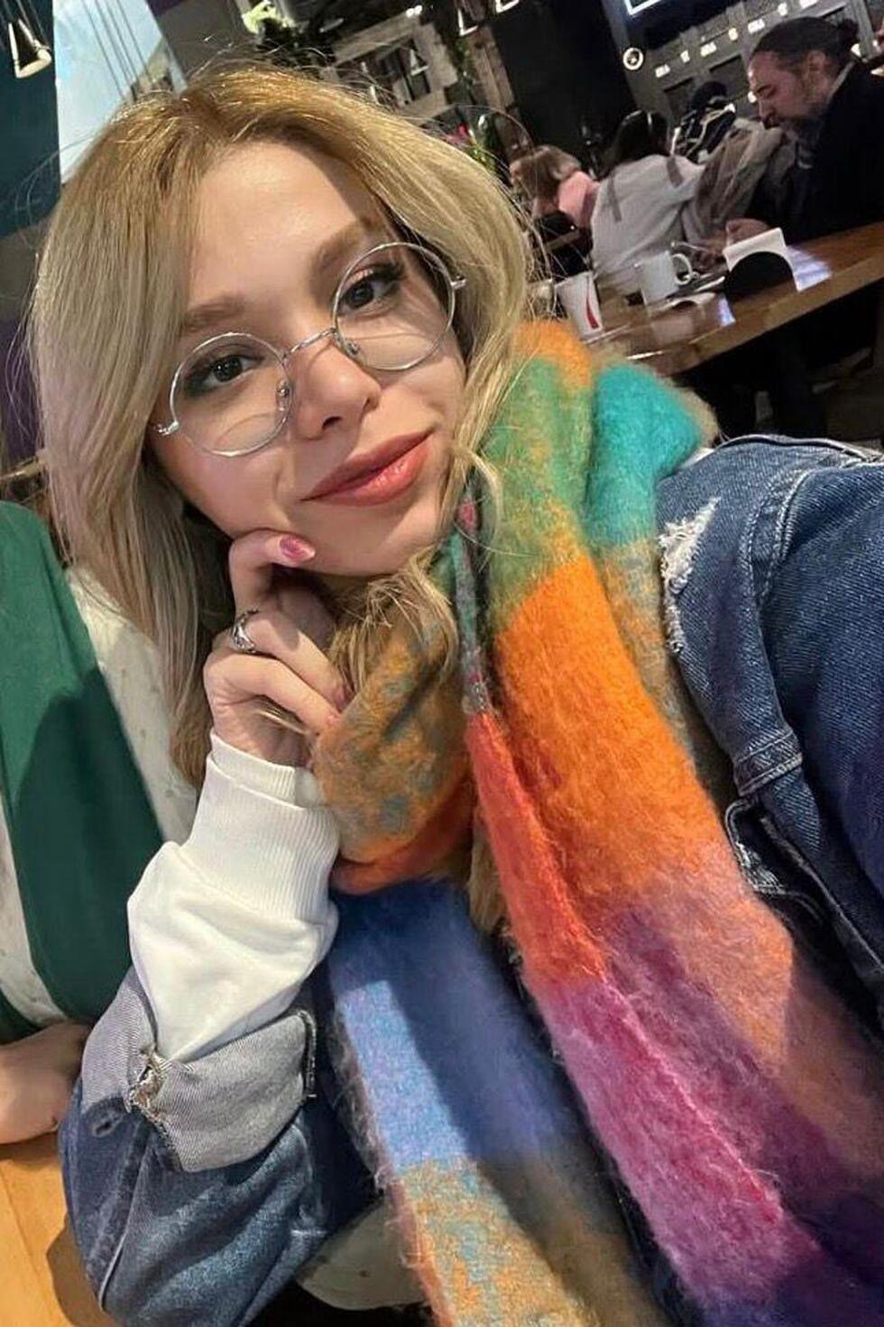 This photo released by the family of Robina Aminian shows her taking a selfie at a cafe in Tehran, Iran, February 14, 2025. 