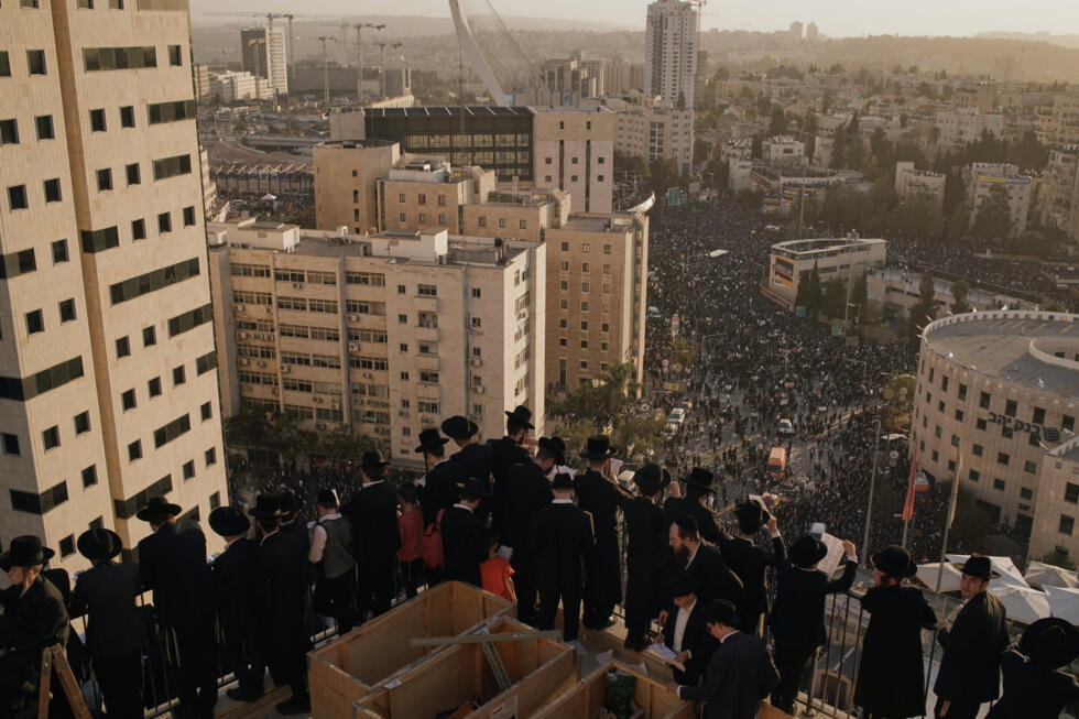 Ultra-Orthodox Jewish men attend a rally against plans to force them to serve in the Israeli military, in Jerusalem, on October 30, 2025.