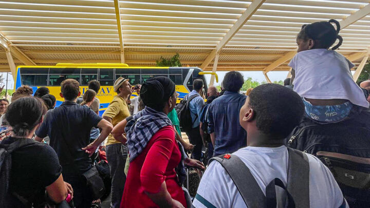 French nationals wait to be flown to France on a French military aircraft at the international airport in Niamey, Niger on August 1, 2023.